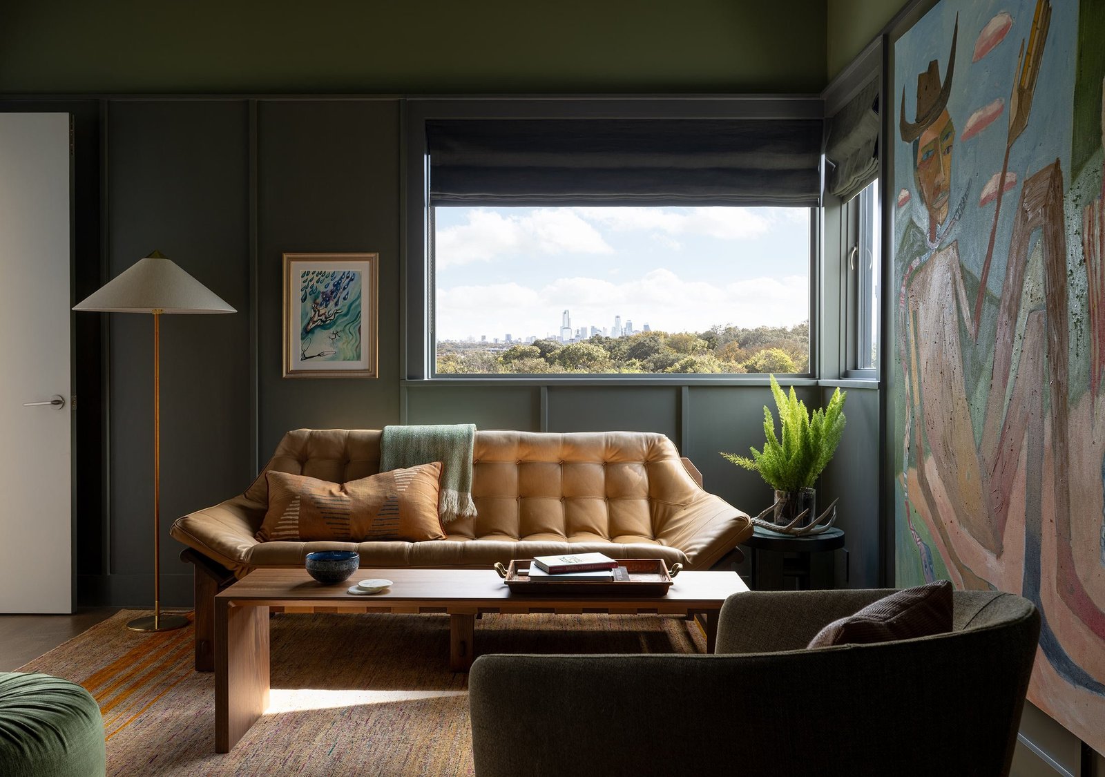 sitting room with a window toward the downtown skyline